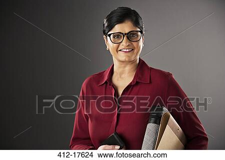 Portrait of confident businesswoman View Large Photo Image Picture - Portrait of confident businesswoman. Fotosearch