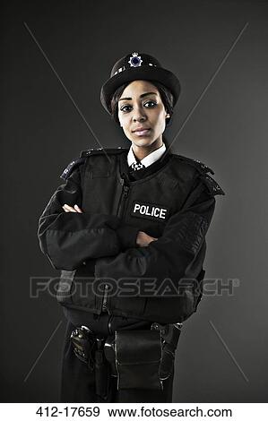 Portrait of serious policewoman View Large Photo Image Stock Photo - Portrait of serious policewoman. Fotosearch