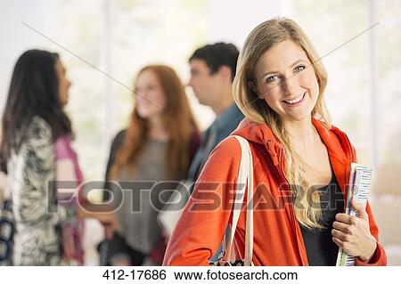 Portrait of smiling college student View Large Photo Image Stock Photograph - Portrait of smiling college student. Fotosearch