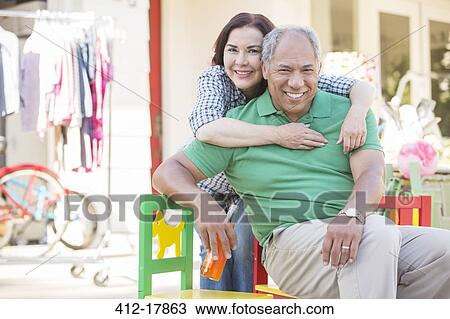 Portrait of smiling couple outdoors View Large Photo Image Stock Image - Portrait of smiling couple outdoors. Fotosearch