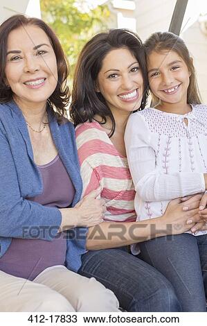 Portrait of smiling multi-generation women View Large Photo Image Stock Image - Portrait of smiling multi-generation women. Fotosearch