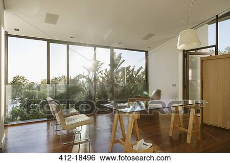 Sunny modern home office View Large Photo Image Stock Photograph - Sunny modern home office. Fotosearch