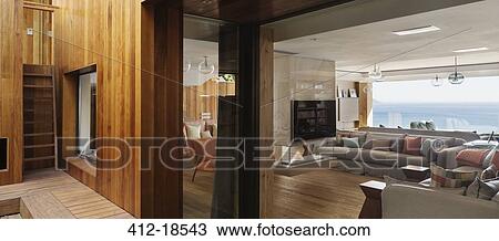 View of modern living room from courtyard View Large Photo Image Stock Image - View of modern living room from courtyard. Fotosearch