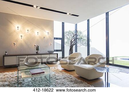 Armchairs and shag rug in modern living room View Large Photo Image Stock Image - Armchairs and shag rug in modern living room. Fotosearch
