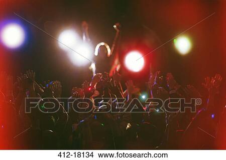 Picture - Audience enjoying concert. Fotosearch