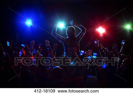 Audience enjoying concert View Large Photo Image Stock Photo - Audience enjoying concert. Fotosearch