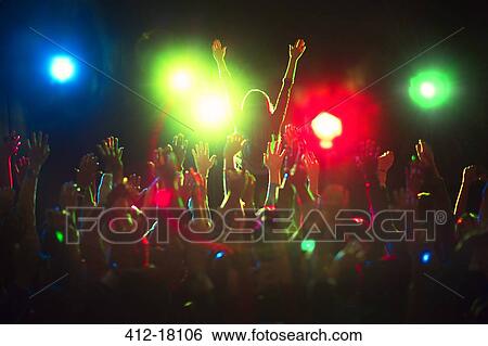 Audience enjoying concert View Large Photo Image Stock Photograph - Audience enjoying concert. Fotosearch