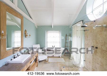 Bathtub and shower in rustic bathroom View Large Photo Image Stock Photograph - Bathtub and shower in rustic bathroom. Fotosearch