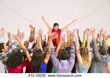 Business people cheering for businesswoman View Large Photo Image Stock Image - Business people cheering for businesswoman. Fotosearch