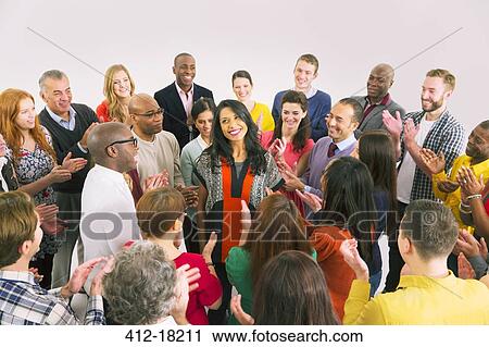 Business people clapping around businesswoman View Large Photo Image Stock Image - Business people clapping around businesswoman. Fotosearch