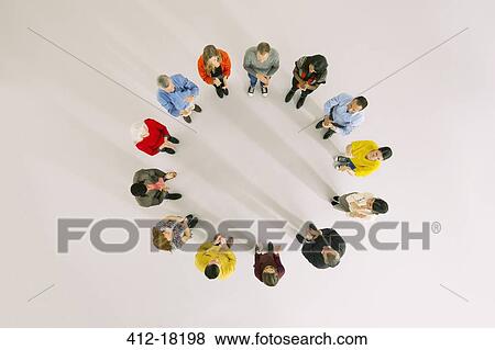 Business people in circle View Large Photo Image Stock Photo - Business people in circle. Fotosearch