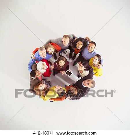 Business people in huddle View Large Photo Image Stock Image - Business people in huddle. Fotosearch