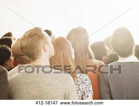 Stock Photo - Business people looking up. Fotosearch