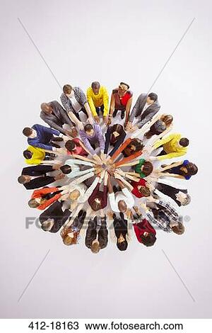 Business people touching hands in huddle View Large Photo Image Stock Image - Business people touching hands in huddle. Fotosearch