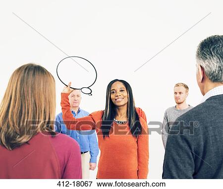 Stock Photo - Businesswoman holding thought bubble. Fotosearch