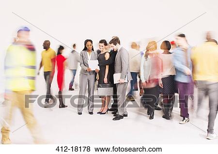 Bustling crowd around business people View Large Photo Image Stock Photo - Bustling crowd around business people. Fotosearch