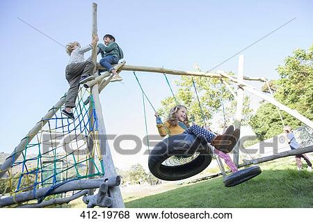 Children playing on play structure View Large Photo Image Stock Photo - Children playing on play structure. Fotosearch