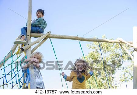 Children playing on play structure View Large Photo Image Stock Photo - Children playing on play structure. Fotosearch