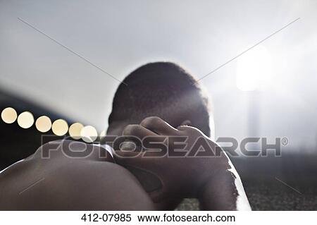 Close up of track and field athlete holding shot put View Large Photo Image Stock Photography - Close up of track and field athlete holding shot put. Fotosearch