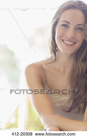 Close up of woman smiling View Large Photo Image Stock Photo - Close up of woman smiling. Fotosearch