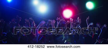 Crowd cheering at concert View Large Photo Image Stock Image - Crowd cheering at concert. Fotosearch