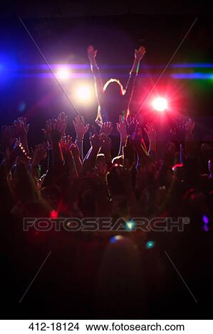 Crowd enjoying concert View Large Photo Image Picture - Crowd enjoying concert. Fotosearch
