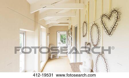 Decorative wall hangings in rustic house View Large Photo Image Stock Image - Decorative wall hangings in rustic house. Fotosearch