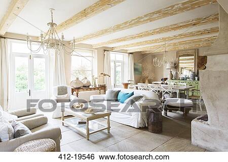 Dining and living area of rustic house View Large Photo Image Stock Photograph - Dining and living area of rustic house. Fotosearch