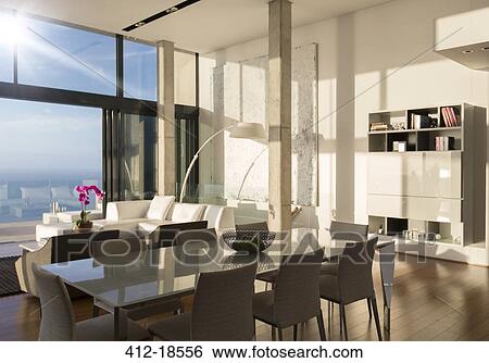 Dining and living space in modern house View Large Photo Image Stock Photograph - Dining and living space in modern house. Fotosearch