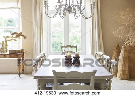 Dining table in rustic house View Large Photo Image Stock Image - Dining table in rustic house. Fotosearch