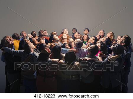 Diverse crowd around bright light View Large Photo Image Stock Image - Diverse crowd around bright light. Fotosearch