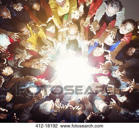 Diverse crowd reaching for bright light View Large Photo Image Stock Image - Diverse crowd reaching for bright light. Fotosearch