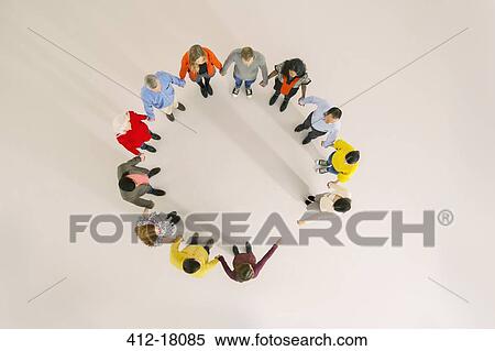 Stock Photography - Diverse group forming circle. Fotosearch