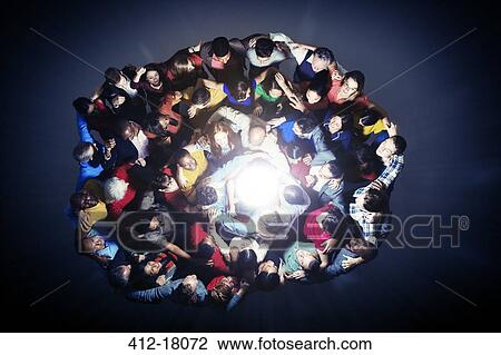 Diverse group in huddle around light View Large Photo Image Stock Image - Diverse group in huddle around light. Fotosearch