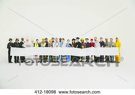 Stock Photo - Diverse workforce holding signs. Fotosearch