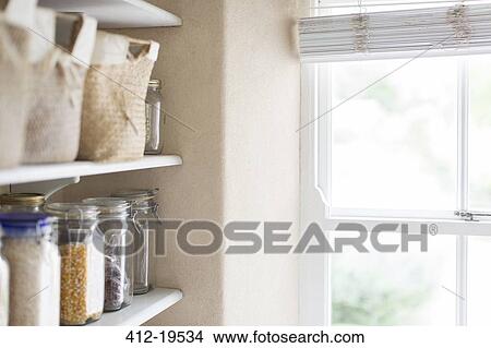 Dry goods and window of pantry View Large Photo Image Picture - Dry goods and window of pantry. Fotosearch