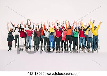 Exuberant crowd jumping View Large Photo Image Stock Photo - Exuberant crowd jumping. Fotosearch