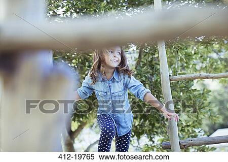 Girl climbing on play structure View Large Photo Image Stock Photography - Girl climbing on play structure. Fotosearch