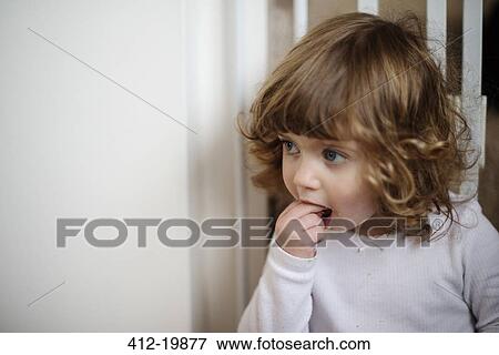 Stock Photo - Girl eating. Fotosearch