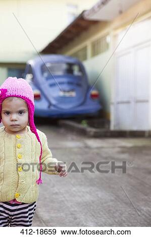 Girl wearing knit cap outdoors View Large Photo Image Stock Photo - Girl wearing knit cap outdoors. Fotosearch