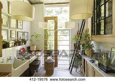 Glass door in rustic kitchen View Large Photo Image Stock Photograph - Glass door in rustic kitchen. Fotosearch