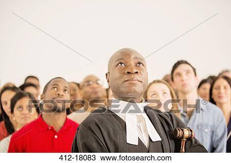 Stock Image - Judge and crowd looking up. Fotosearch