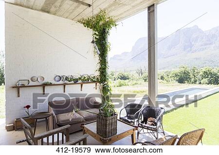 Living area overlooking backyard View Large Photo Image Stock Photo - Living area overlooking backyard. Fotosearch