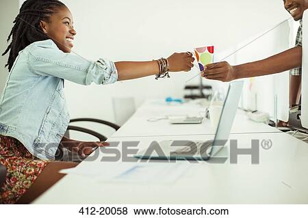 People having coffee in office View Large Photo Image Stock Photo - People having coffee in office. Fotosearch