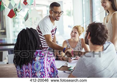 People shaking hands in office View Large Photo Image Stock Photograph - People shaking hands in office. Fotosearch