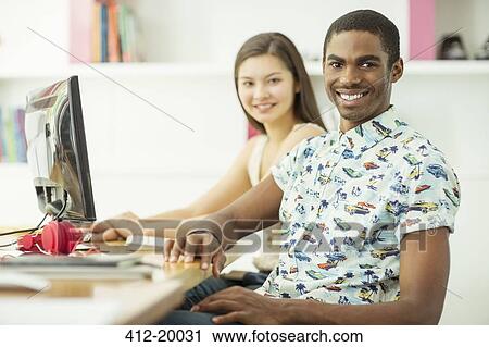 People smiling together in office View Large Photo Image Stock Image - People smiling together in office. Fotosearch