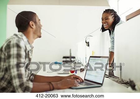 People talking in office View Large Photo Image Stock Image - People talking in office. Fotosearch
