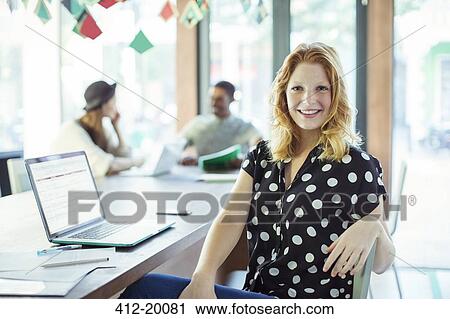 People working at conference table in office View Large Photo Image Stock Image - People working at conference table in office. Fotosearch