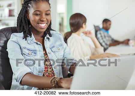 People working at conference table in office View Large Photo Image Stock Image - People working at conference table in office. Fotosearch