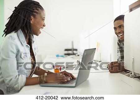 People working in laptop in office View Large Photo Image Stock Image - People working in laptop in office. Fotosearch